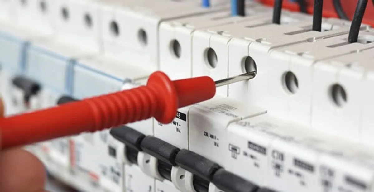 Electrical contractor testing circuit breakers during electrical repair in Murrells Inlet, SC
