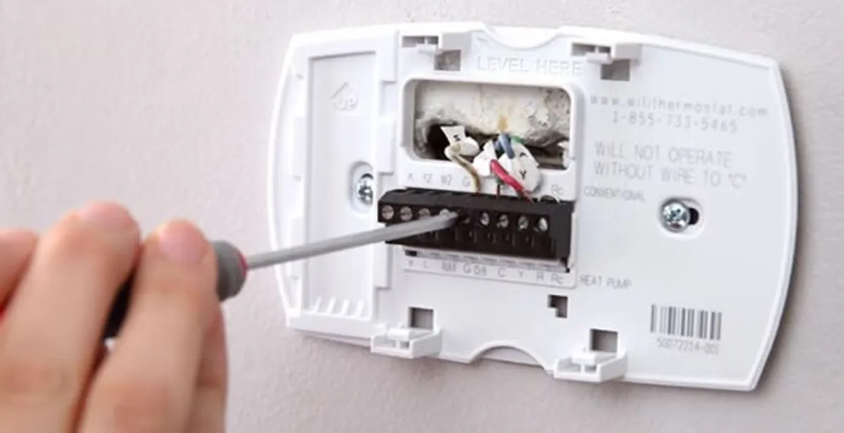 Thermostat installation service with proper wiring and secure wall mounting in Myrtle Beach, SC